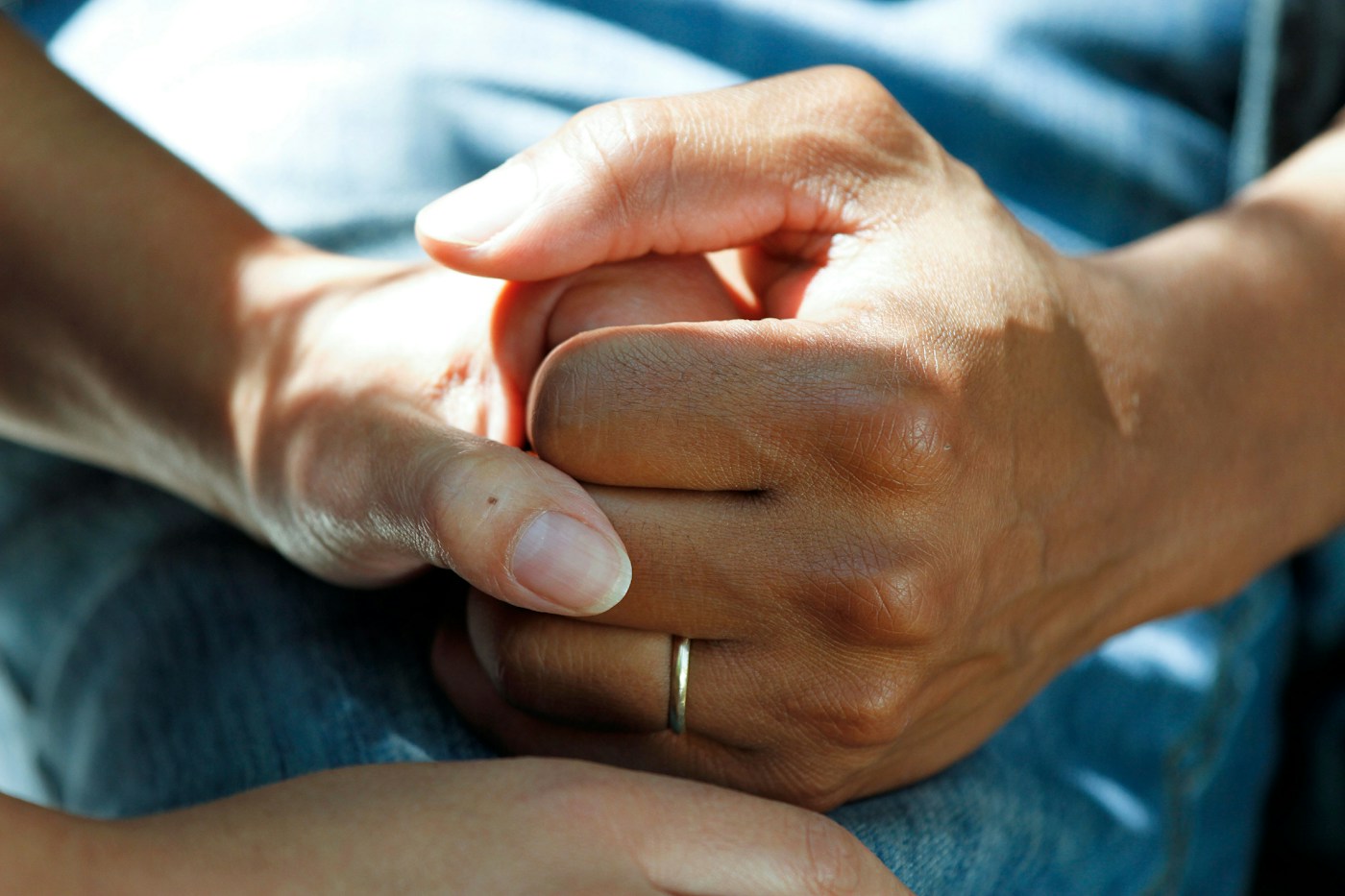Care professional speaking with an older adult